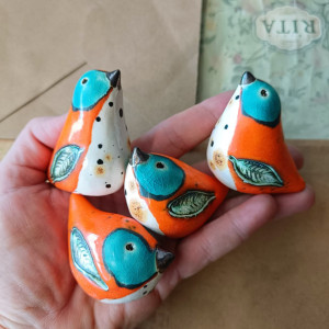 Ptaszki pomarańczowe z niebieskim oczkiem