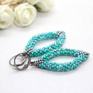 owalne kolczyki 3D - błękitny melanż