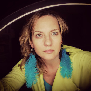 Klipsy niebieskie strusie pióra polecam