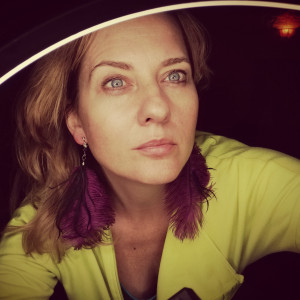 Klipsy fioletowe strusie pióra polecam