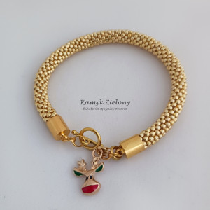 Bransoletka złoto-czerwona z renirerkiem