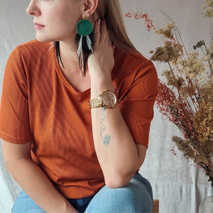 Kolczyki butelkowa zieleń z piórami