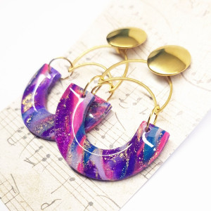 Boskie kolczyki z kolekcji Kosmos Wachlarze