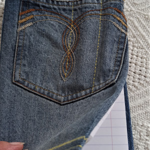 Jeansowa okładka na zeszyt z kieszonką