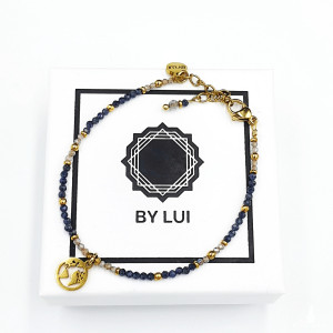 Delikatna Bransoletka z Zawieszką Globem Ziemskim GOLDEN TRAVELER