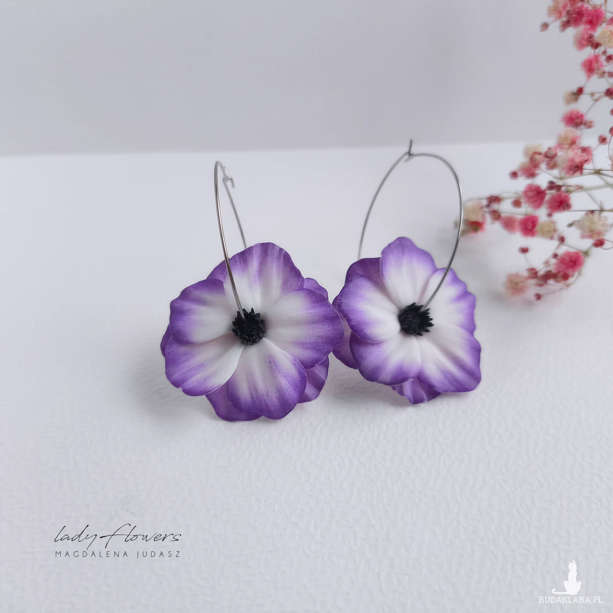 Kolczyki z kwiatami na kołach