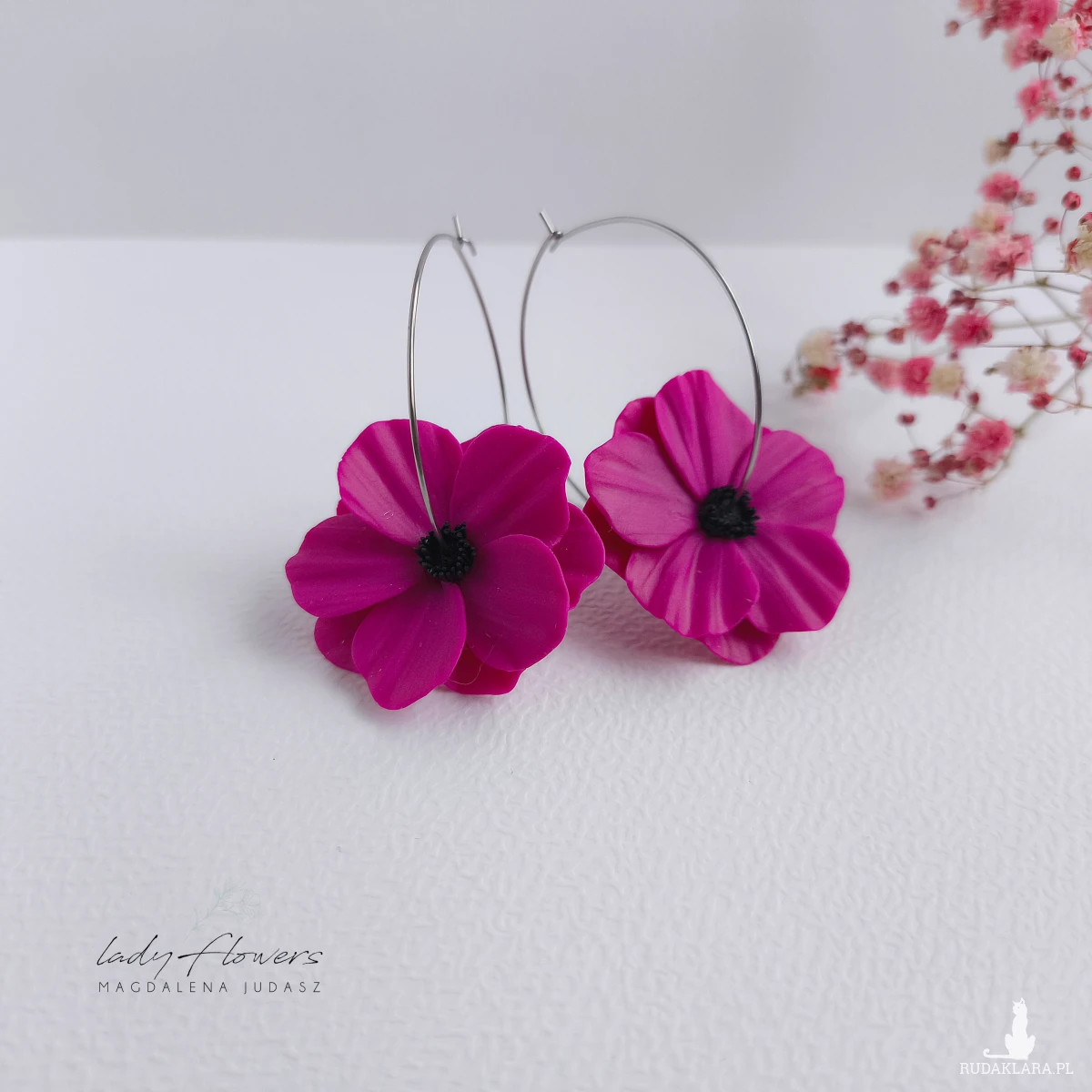 Kolczyki z kwiatami na kołach