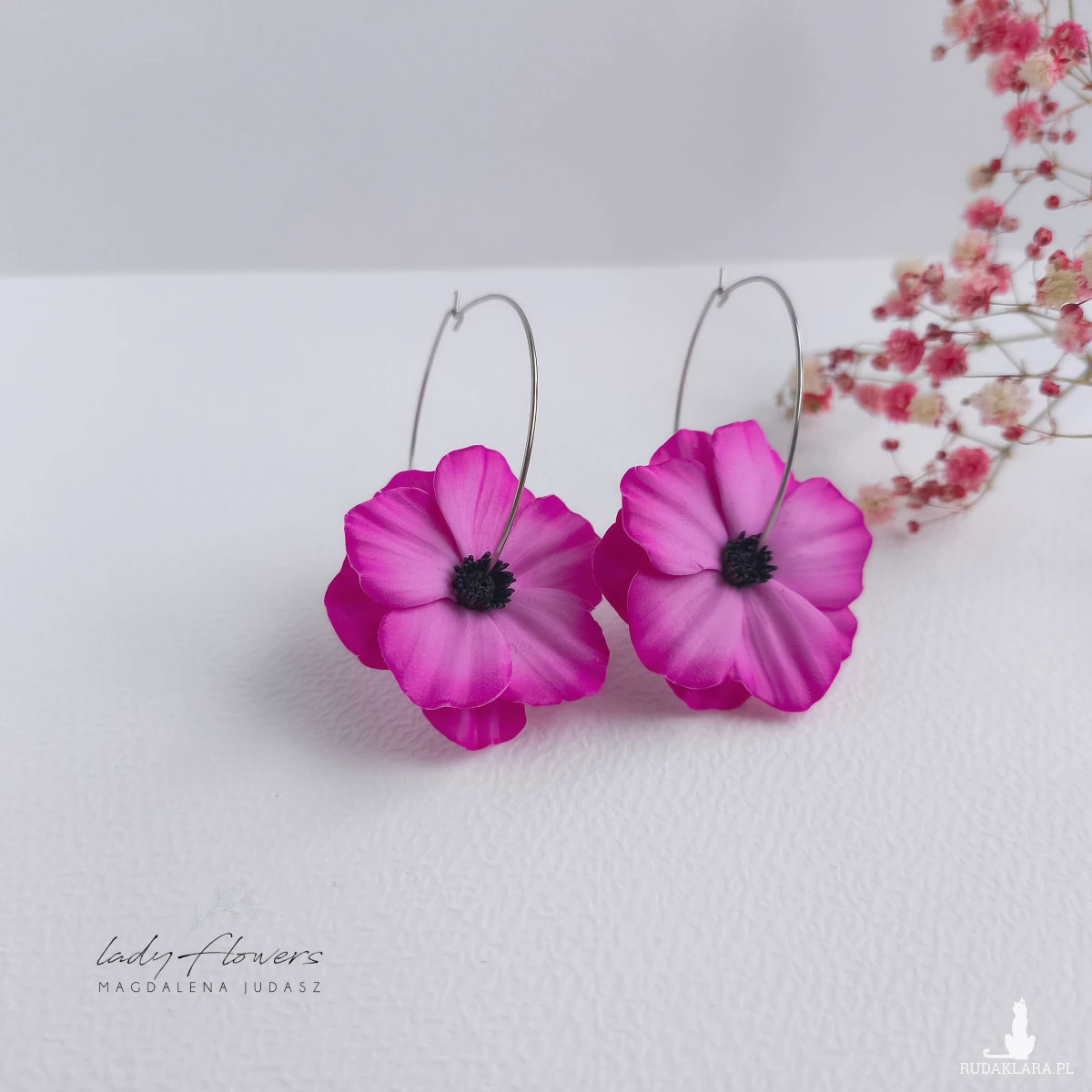 Kolczyki z kwiatami na kołach