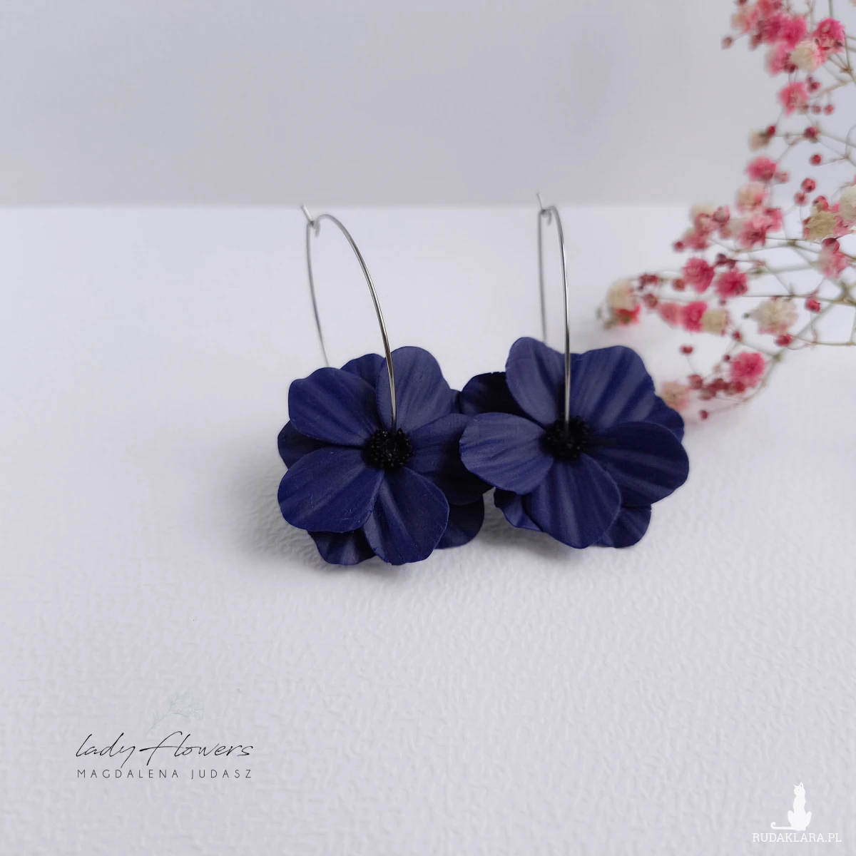 Kolczyki z kwiatami na kołach