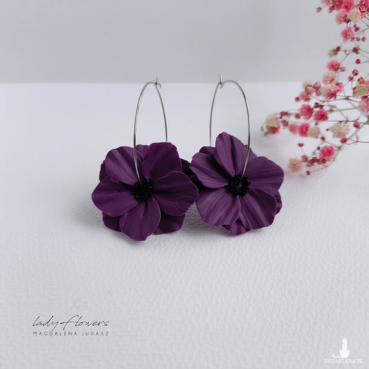 Kolczyki z kwiatami na kołach