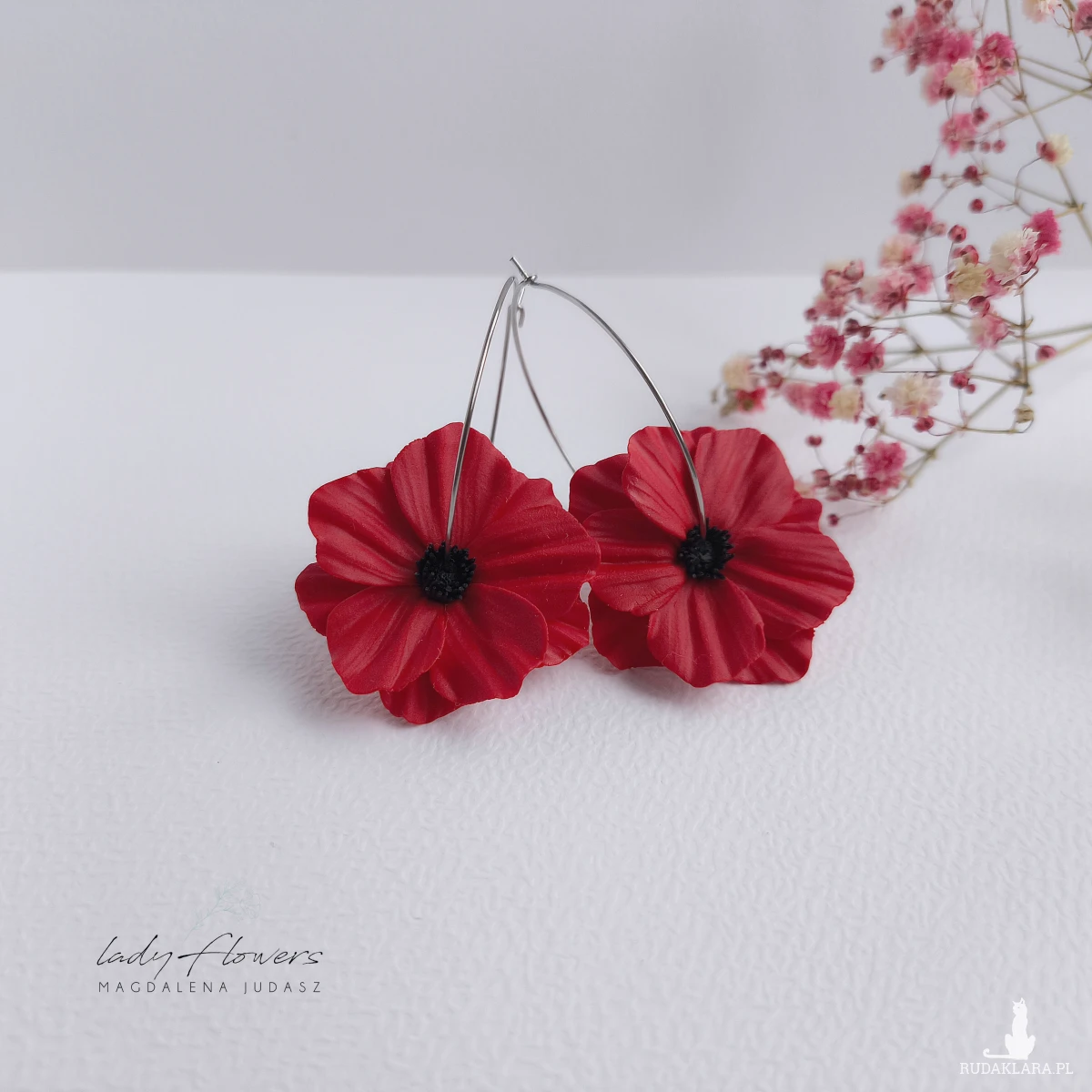 Kolczyki z kwiatami na kołach