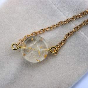 Bransoletka z zatopionymi rzęskami dmuchawca