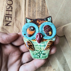 Sowa z zamkniętym oczkiem