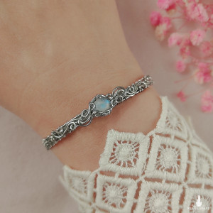 Bransoletka Kamień Księżycowy sztywna stal chirurgiczna wirewrapping handmade