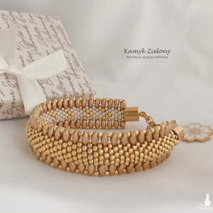 Bransoletka "gąsieniczka" złota Starlight - wykończenia ze stali chirurgicznej