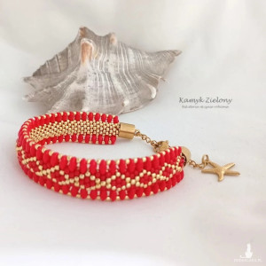 Bransoletka "gąsieniczka" czerwono-złota - wykończenia ze stali chirurgicznej