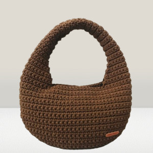 Mała torebka na ramię, okrągła torba.