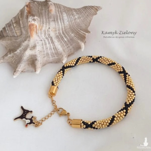 Bransoletka ze świąteczną zawieszką - reniferem