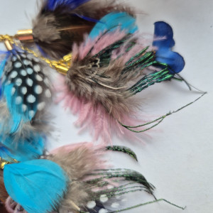 klipsy pióra szaleństwo