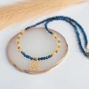 Naszyjnik kryształ górski ze złotym rutylem + niebieski agat z różą wiatrów