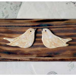 Wieszak z zakochanymi ptakami