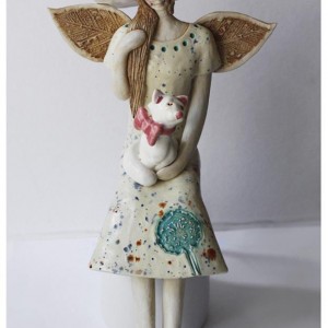 Anioł z wytwornym kotem