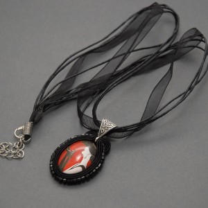 wisiorek sutasz - kobieta