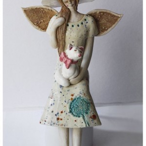 Anioł z wytwornym kotem