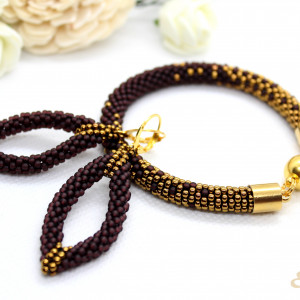 komplet biżuterii fioletowo-złoty