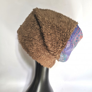 Czapka w notatniku z Batmanem pisał