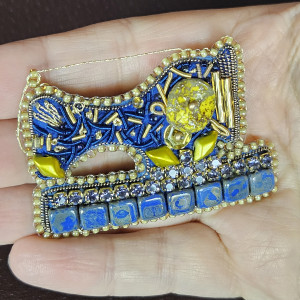 Maszyna do szycia broszka