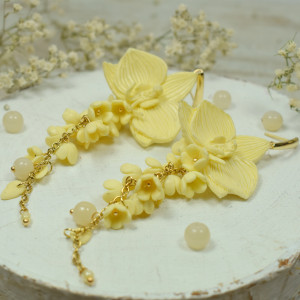 Długie kolczyki orchidee - pastolowy żółty