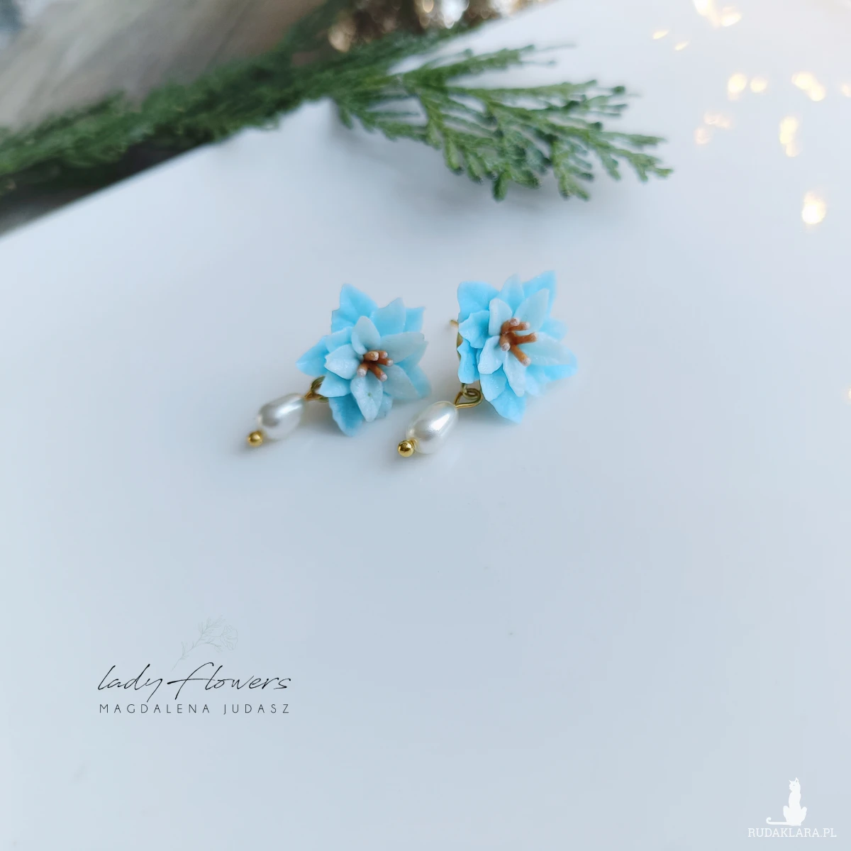 Kolczyki z błękitnymi poisencjami