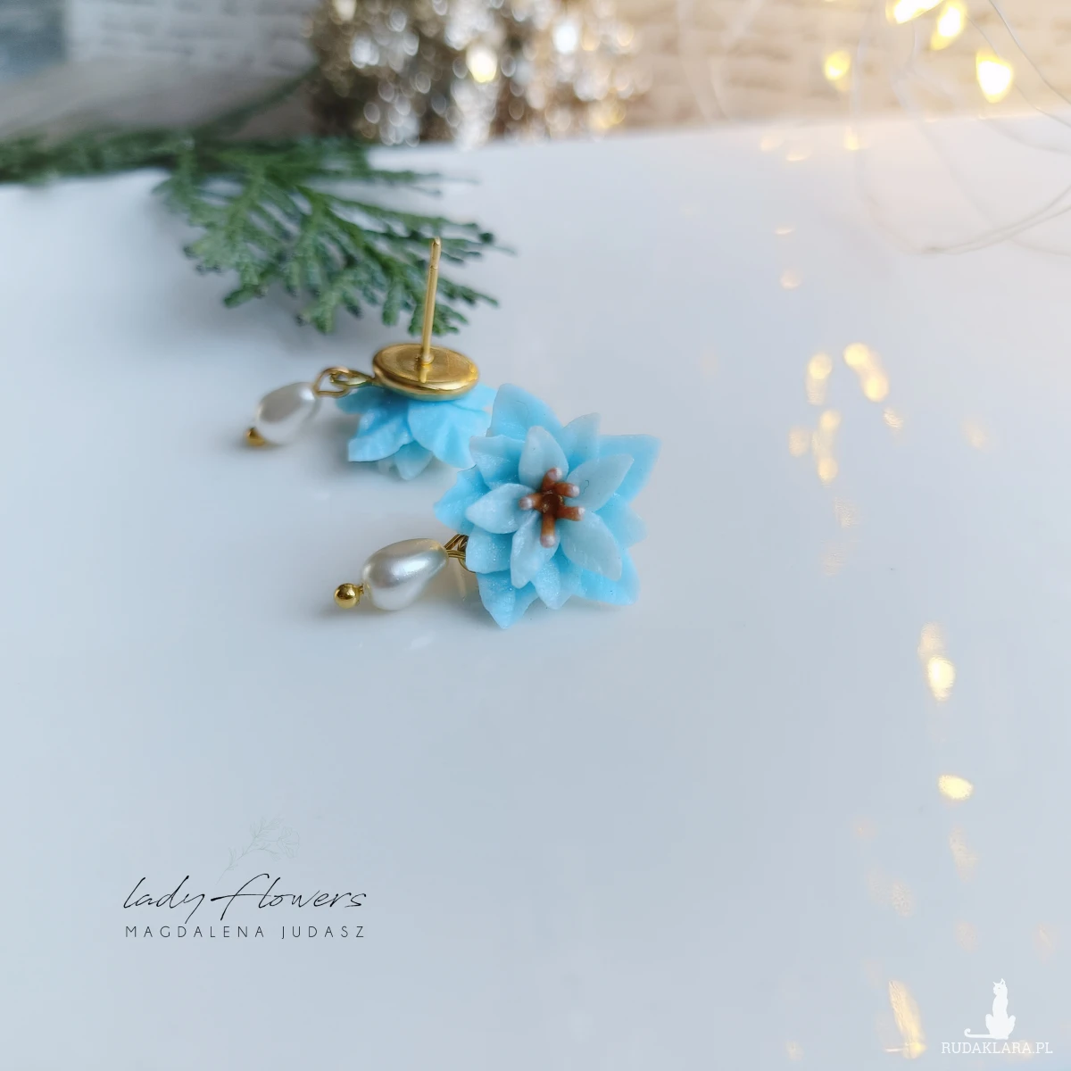 Kolczyki z błękitnymi poisencjami