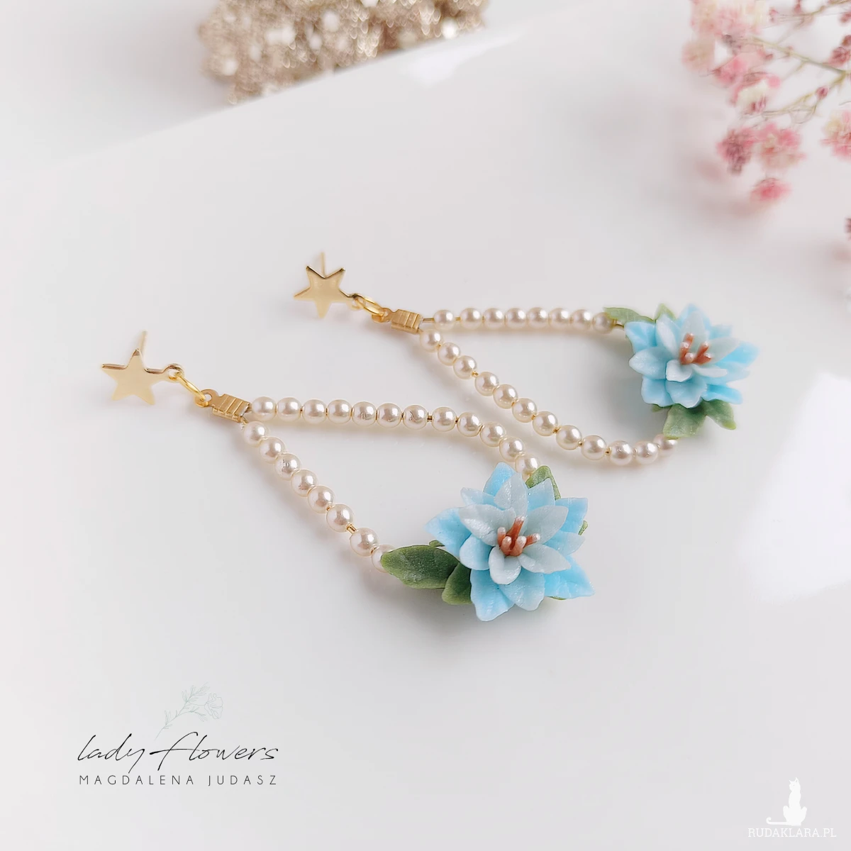 Kolczyki z niebieskimi poisencjami