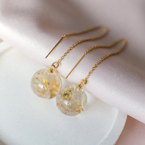 Kolczyki z rzęsek dmuchawca