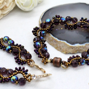 fioletowy komplet biżuterii ze szklanych kryształków