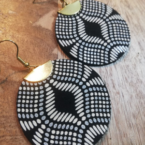 Kolczyki z włoskiej skóry oraz stali chirurgicznej koła