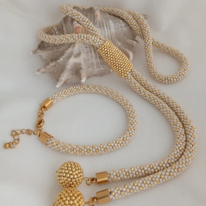 Komplet naszyjnik z opaską i bransoletka - beżowo-złoty