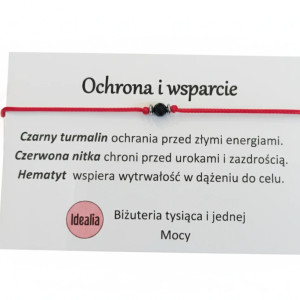 Bransoletka na czerwonym sznureczku z czarnym turmalinem.