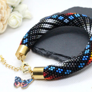 Tęczowa bransoletka z drobniutkich koralików - ukośnik