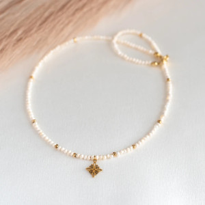 Naszyjnik perły z zawieszką gwiazdka