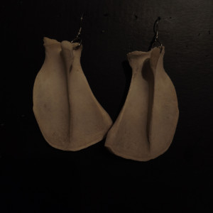 Wyraźne kolczyki łopatki szczeniaka