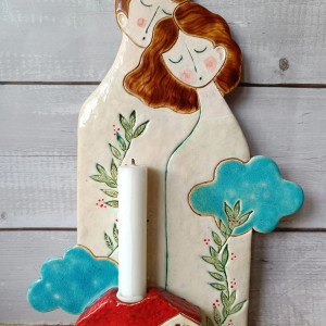 Para bujająca w obłokach z miejscem na świeczkę