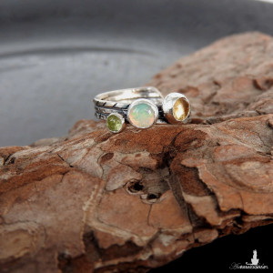 Pierścionek srebrny potrójny zielony