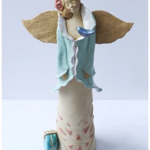 Anioł podróżny z walizką