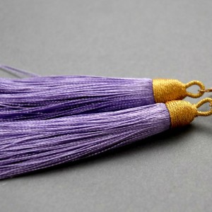 kolczyki lub klipsy z chwostami (lawendowe)